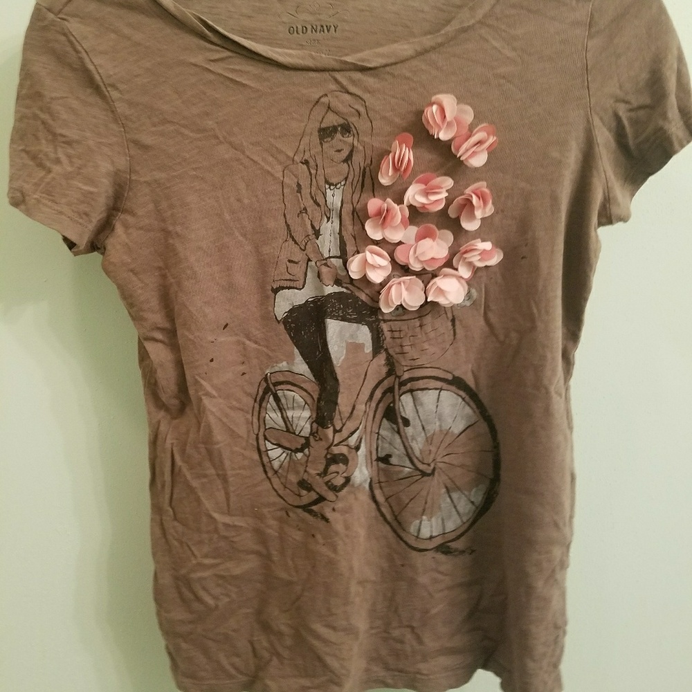Brown t-shirt with girl on a bike